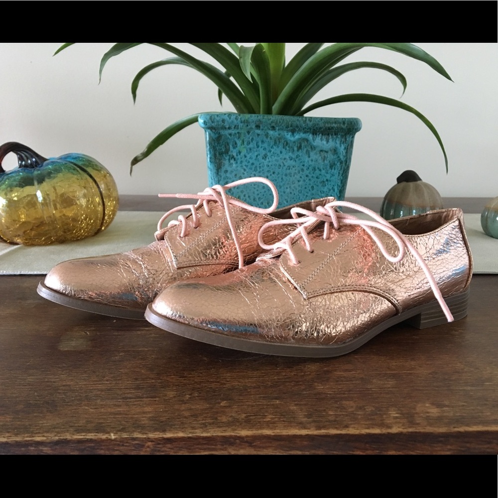A pair of oxfords style shoes